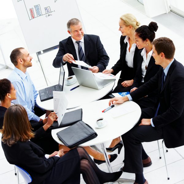 High angle view of business people discussing in a meeting